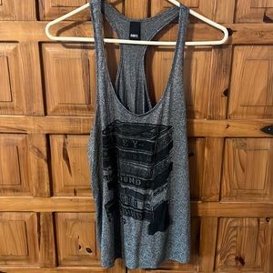 Adorable razor back stacks of books obey tank